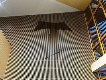 For the Tau Cross symbol, SUPASLAT panels were customised with alternating profile depths and finishes