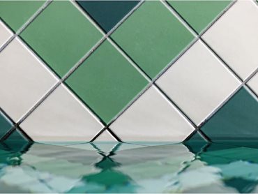 A close-up of the pool's tile design