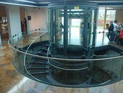 commercial stairs curved glass banister