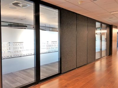 Unifold Holdings Glass Wall