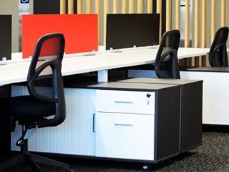 Perspex® Frost Workstation dividers used in the office